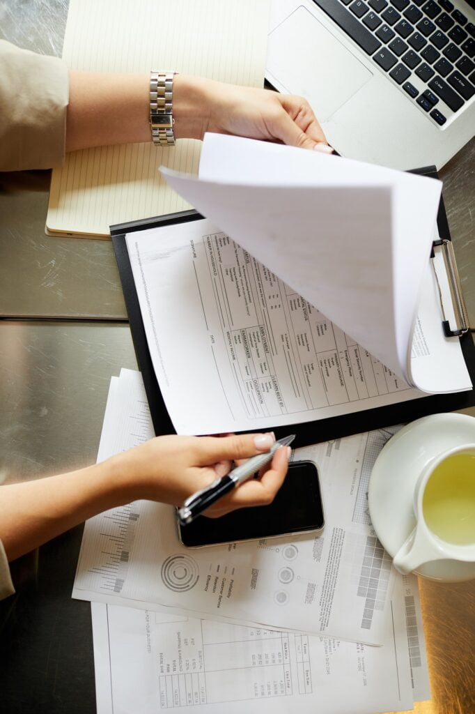 Woman signing documents